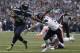 Seattle Seahawks running back Marshawn Lynch runs past Chicago Bears linebacker Shea McClellin in the first half of a preseason NFL football game, Friday, Aug. 22, 2014, in Seattle. (AP Photo/Stephen Brashear)