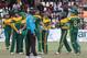 South African players celebrate the wicket of Zimbabwean batsman Sikandar Razar during the cricket One Day International in Harare Zimbabwe Thursday, Sept. 4, 2014.(AP Photo/Tsvangirayi Mukwazhi)
