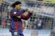 Barcelona's Ronaldinho reacts after scoring a goal against Zaragoza during their Spanish league soccer match at the La Romareda stadium in Zaragoza, Spain, Saturday, Feb. 16, 2008. (AP Photo/Manu Fernandez)