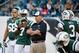 New York Jets head coach Rex Ryan, center, and quarterback Geno Smith (7) watch warm-ups before an NFL preseason football game against the Philadelphia Eagles, Thursday, Aug. 28, 2014, in Philadelphia. (AP Photo/Chris Szagola)