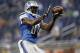Detroit Lions wide receiver Calvin Johnson (81) catches a ball during warmups for a NFL football game against the Jacksonville Jaguars in Detroit, Friday, Aug. 22, 2014. (AP Photo/Paul Sancya)