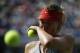 Maria Sharapova, of Russia, prepares to serve against Caroline Wozniacki, of Denmark, during the fourth round of the 2014 U.S. Open tennis tournament, Sunday, Aug. 31, 2014, in New York. (AP Photo/Kathy Willens)
