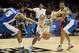Argentina's Nicolas Laprovittola, center, in action with Greece's Georgios Printezis, left, and Nikos Zisis during the Group B Basketball World Cup match in Seville, Spain, Thursday, Sept. 4, 2014. The 2014 Basketball World Cup competition will take place in various cities in Spain from Aug. 30 through to Sept. 14. (AP Photo/Miguel Angel Morenatti)