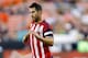 Jul 20, 2014; Washington, DC, USA; Chivas USA defender Carlos Bocanegra (3) dribbles the ball against D.C. United at Robert F. Kennedy Memorial Stadium. Mandatory Credit: Geoff Burke-USA TODAY Sports