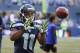 Seattle Seahawks wide receiver Percy Harvin catches a pass during warm-ups for an NFL football game against the Green Bay Packers, Thursday, Sept. 4, 2014, in Seattle. (AP Photo/Elaine Thompson)