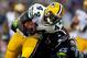 SEATTLE, WA - SEPTEMBER 04: Running back James Starks #44 of the Green Bay Packers is hit by cornerback Richard Sherman #25 of the Seattle Seahawks during the third quarter of the game at CenturyLink Field on September 4, 2014 in Seattle, Washington. (Photo by Otto Greule Jr/Getty Images)