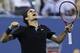 Roger Federer, of Switzerland, celebrates his win over Gael Monfils, of France, during the quarterfinal round of the 2014 U.S. Open tennis tournament, Thursday, Sept. 4, 2014, in New York. Federer defeated Monfils 4-6, 3-6, 6-4, 7-5, 6-2. (AP Photo/Charles Krupa)