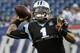 Carolina Panthers quarterback Cam Newton warms up before an NFL preseason football game against the New England Patriots, Friday, Aug. 22, 2014, in Foxborough, Mass. (AP Photo/Stephan Savoia)