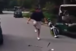 Enraged Golfer Snaps His Clubs in Half