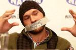 Fury Protests by Taping His Mouth