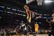 LOS ANGELES, CA - DECEMBER 20: Xavier Henry #7 of the Los Angeles Lakers attempts a dunk against Kevin Love #42 of the Minnesota Timberwolves at Staples Center on December 20, 2013 in Los Angeles, California. NOTE TO USER: User expressly acknowledges and agrees that, by downloading and/or using this Photograph, user is consenting to the terms and conditions of the Getty Images License Agreement. Mandatory Copyright Notice: Copyright 2013 NBAE (Photo by Noah Graham/NBAE via Getty Images)