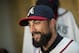 Atlanta Braves newest outfielder Nick Markakis speaks with reporters in the baseball team's clubhouse, Friday, Dec. 5, 2014, in Atlanta. Markakis signed a four-year contract with the team on Wednesday. (AP Photo/David Goldman)