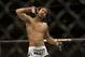 Benson Henderson gestures while fighting Gilbert Melendez in a UFC lightweight championship mixed martial arts fight in San Jose, Calif., Saturday, April 20, 2013. Henderson won by split decision to retain the championship. (AP Photo/Jeff Chiu)