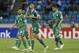 Algeria's, Nabil Bentaleb, centre, celebrates after he scored a goal against Senegal during their final Group C African Cup of Nations soccer match at Estadio De Malabo in Malabo, Equatorial Guinea, Tuesday, Jan. 27, 2015. (AP Photo/Sunday Alamba)