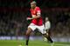 Manchester United's Ashley Young during the English Premier League soccer match between Manchester United and Stoke City at Old Trafford Stadium, Manchester, England, Tuesday Dec. 2, 2014. (AP Photo/Jon Super)