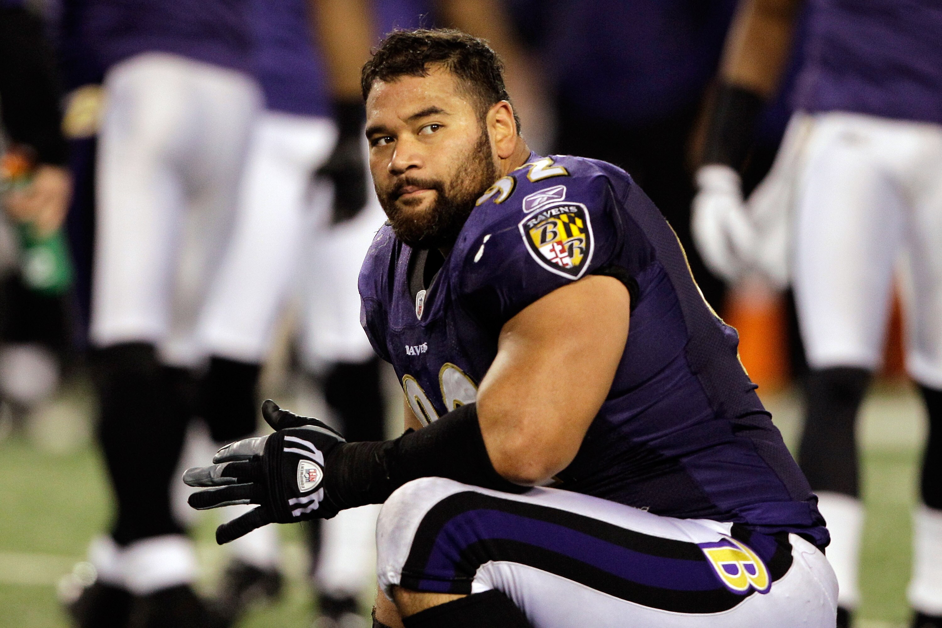 BALTIMORE, MD - OCTOBER 16:  Haloti Ngata #92 of the Baltimore Ravens kneels on the turf during a play review against the Houston Texans at M&T Bank Stadium on October 16, 2011 in Baltimore, Maryland. The Ravens won 29-14.  (Photo by Rob Carr/Getty Images)