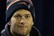 New England Patriots quarterback Tom Brady listens to a reporter's question during a media availability at the NFL football team's facility in Foxborough, Mass., Wednesday, Nov. 20, 2013. Brady and the Patriots will play Peyton Manning and the Denver Broncos Sunday night in Foxborough. (AP Photo/Stephan Savoia)