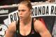 LOS ANGELES, CA - FEBRUARY 28: Ronda Rousey enters the Octagon in her UFC women's bantamweight championship bout against Cat Zingano during the UFC 184 event at Staples Center on February 28, 2015 in Los Angeles, California. (Photo by Harry How/Getty Images)