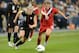 KANSAS CITY, KS - SEPTEMBER 17: Defender Becky Sauerbrunn #4 of the United States chases down a loose ball against pressure from mid-fielder Chelsea Stewart #19 of Canada during the second half on September 17, 2011 at LiveStrong Sporting Park in Kansas City, Kansas. The United States and Canada ended in a 1-1 tie. (Photo by Peter Aiken/Getty Images)