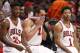 Chicago Bulls' players from left, Jimmy Butler, Joakim Noah, and Derrick Rose, wait for play to resume during the second half in Game 5 of the NBA basketball playoffs against the Milwaukee Bucks Monday, April 27, 2015, in Chicago. The Bucks won 94-88. (AP Photo/Charles Rex Arbogast)