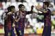 CORDOBA, SPAIN - MAY 02: Lionel Messi (L) of FC Barcelona celebrates scoring their sixth goal with teammates Neymar JR. (2ndL), Luis Suarez (2ndR) and Sergio Busquets Burgos (R) during the La Liga match between Cordoba CF and Barcelona FC at El Arcangel stadium on May 2, 2015 in Cordoba, Spain. (Photo by Gonzalo Arroyo Moreno/Getty Images)