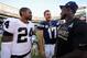 SAN DIEGO, CA - NOVEMBER 16: Charles Woodson #24 (L) of the Oakland Raiders and quarterback Philip Rivers #17 of the San Diego Chargers smile after the Chargers defeated the Oakland Raiders 13-6 in the game at Qualcomm Stadium on November 16, 2014 in San Diego, California. (Photo by Donald Miralle/Getty Images)
