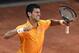 Serbia's Novak Djokovic celebrates after defeating Switzerland's Roger Federer in their men's final match at the Italian Open tennis tournament, in Rome, Sunday, May 17, 2015. Djokovic won 6-4 6-3. (Claudio Onorati/ANSA via AP) ITALY OUT