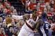 Portland Trail Blazers forward LaMarcus Aldridge, left, works the ball in against Memphis Grizzlies forward Zach Randolph during the first half of Game 4 of a first-round NBA basketball playoff series in Portland, Ore., Monday, April 27, 2015. (AP Photo/Don Ryan)