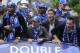 Chelsea's John Terry, right, Frank Lampard, centre right, Petr Cech, centre, and Didier Drogba react, from the top of a bus during a parade, near the Stamford Bridge Stadium, in London, Sunday May 16, 2010. Chelsea overcame a resilient Portsmouth side, to win a dramatic FA Cup final 1-0 and clinch their first League and Cup Double on Saturday. (AP Photo/Tom Hevezi)