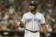 San Diego Padres left fielder Justin Upton (10) reacts after in the sixth inning during a baseball game against the Arizona Diamondbacks, Saturday, June 20, 2015, in Phoenix. (AP Photo/Rick Scstriking out uteri)
