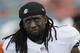 Miami Dolphins linebacker Kelvin Sheppard looks up at the scoreboard as he walks the sidelines during the second half of an NFL football game against the Baltimore Ravens, Sunday, Dec. 7, 2014 in Miami Gardens, Fla. The Ravens defeated the Dolphins 28-13. (AP Photo/Wilfredo Lee)