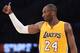 Kobe Bryant of the Los Angeles Lakers gestures on court during NBA action against the Miami Heat at Staples Center in Los Angeles, California. AFP PHOTO / ROBYN BECK (Photo credit should read ROBYN BECK/AFP/Getty Images)