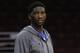 Philadelphia 76ers' Joel Embiid of Cameroon looks on during warm-ups prior to the first half of an NBA basketball game against the Brooklyn Nets, Wednesday, Nov. 26, 2014, in Philadelphia. (AP Photo/Chris Szagola)