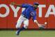 Chicago Cubs center fielder Dexter Fowler catches out Cincinnati Reds' Adam Duvall in the sixth inning of a baseball game, Tuesday, Sept. 29, 2015, in Cincinnati. The Cubs won 4-1. (AP Photo/John Minchillo)