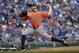 Houston Astros starting pitcher Scott Kazmir throws during the first inning of Game 2 in baseball's American League Division Series against the Kansas City Royals, Friday, Oct. 9, 2015, in Kansas City, Mo. (AP Photo/Charlie Riedel)