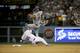 New York Mets shortstop Ruben Tejada, goes over the top of Los Angeles Dodgers' Chase Utley who broke up a double play during the seventh inning in Game 2 of baseball's National League Division Series, Saturday, Oct. 10, 2015 in Los Angeles. (AP Photo/Gregory Bull)