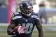 In this Oct. 13, 2013, photo, Seattle Seahawks' Derrick Coleman carries the ball against the Tennessee Titans during an NFL football game in Seattle. Coleman never listened to all those people telling him what he couldn't do. He couldn't hear them, anyway, on his way to becoming first deaf offensive player in the NFL. (AP Photo/Elaine Thompson)