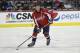 Washington Capitals defenseman John Carlson (74) skates with the puck against the San Jose Sharks during the first period of an NHL hockey game, Tuesday, Oct. 13, 2015, in Washington. (AP Photo/Nick Wass)