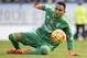 Real Madrid's Costa Rican goalkeeper Keylor Navas looks at the ball during the Spanish league football match Celta Vigo vs Real Madrid CF at the Balaidos stadium in Vigo on October 24, 2015. Real Madrid won the match 3-1. AFP PHOTO / MIGUEL RIOPA (Photo credit should read MIGUEL RIOPA/AFP/Getty Images)