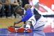 Orlando Magic guard Victor Oladipo gets up slowly after he was injured during the first half of an NBA basketball game against the Los Angeles Lakers, Wednesday, Nov. 11, 2015, in Orlando, Fla. (AP Photo/John Raoux)