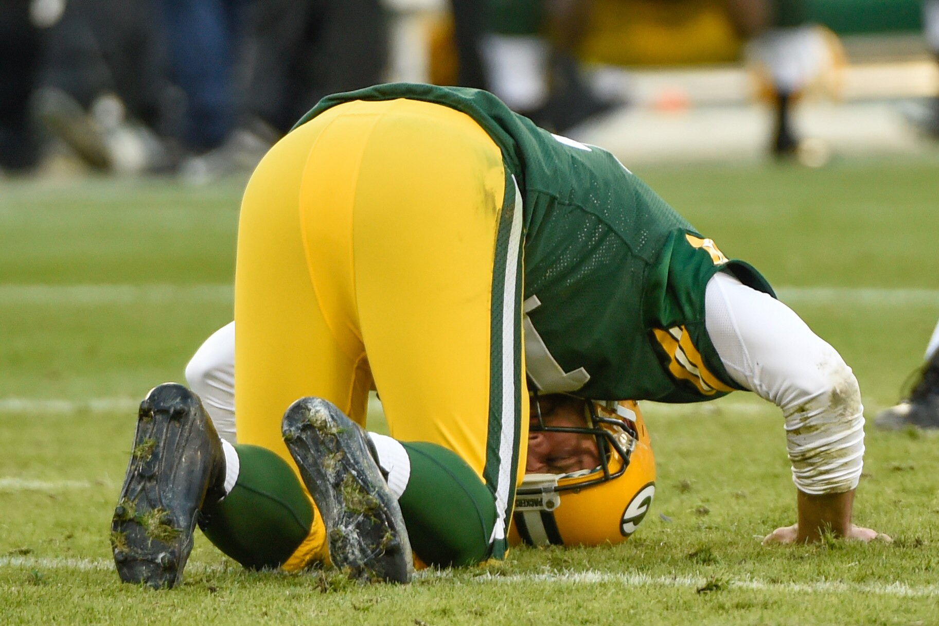 Nov 15, 2015; Green Bay, WI, USA;  Green Bay Packers quarterback Aaron Rodgers (12) reacts after a failed 2-point conversion attempt in the fourth quarter during the game against the Detroit Lions at Lambeau Field. The Ljons beat the Packers 18-16. Mandatory Credit: Benny Sieu-USA TODAY Sports