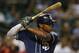 San Diego Padres left fielder Justin Upton (10) fields the ball against the Arizona Diamondbacks in the sixth inning during a baseball game, Tuesday, Sept. 15, 2015, in Phoenix. (AP Photo/Rick Scuteri)