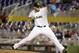 Miami Marlins starting pitcher Jose Fernandez throws in the first inning of a baseball game against the Atlanta Braves, Friday, Sept. 25, 2015, in Miami. (AP Photo/Lynne Sladky)