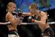 LAS VEGAS, NEVADA - DECEMBER 10: (R) Rose Namajunas punches Paige VanZant in their women's strawweight bout during the UFC Fight Night event at The Chelsea at the Cosmopolitan of Las Vegas on December 10, 2015 in Las Vegas, Nevada. (Photo by Brandon Magnus/Zuffa LLC/Zuffa LLC via Getty Images)