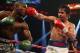 LAS VEGAS, NV - APRIL 12: Manny Pacquiao throws a right hand at Timothy Bradley at the MGM Grand Garden Arena on April 12, 2014 in Las Vegas, Nevada. (Photo by Jeff Gross/Getty Images)