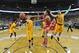 WICHITA, KS - DECEMBER 12: Guard Brandon Taylor #11 of the Utah Utes passes the ball between defenders Fred VanVleet #23 and Ron Baker #31 of the Wichita State Shockers during the first half on December 12, 2015 at Intrust Bank Arena in Wichita, Kansas. Wichita State defeated Utah 67-50. (Photo by Peter Aiken/Getty Images)