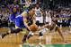 Golden State Warriors' Stephen Curry grabs a loose ball away from Boston Celtics' Avery Bradley during the second half of the Golden State Warriors 106-101 win over the Boston Celtics in an NBA basketball game in Boston Sunday, March 1, 2015. (AP Photo/Winslow Townson)