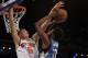 Dec 16, 2015; New York, NY, USA; Minnesota Timberwolves guard Andrew Wiggins (22) has his shot blocked by New York Knicks forward Kristaps Porzingis (6) during the first half of an NBA basketball game at Madison Square Garden. Mandatory Credit: Adam Hunger-USA TODAY Sports