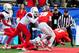 Dec 19, 2015; Albuquerque, NM, USA; New Mexico Lobos quarterback Lamar Jordan (13) runs for a 31 yard touchdown as wide receiver Matt Quarells (19) blocks and Arizona Wildcats safety Jamar Allah (7) and safety Will Parks (11) defend during the first half in the 2015 New Mexico Bowl at University Stadium. Mandatory Credit: Matt Kartozian-USA TODAY Sports