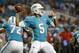 Miami Dolphins quarterback Josh Freeman (5) looks to pass during the second half of an NFL preseason football game against the Tampa Bay Buccaneers, Thursday, Sept. 3, 2015, in Miami Gardens, Fla. (AP Photo/Wilfredo Lee)